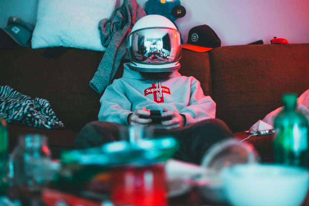 Focused person in virtual reality casque playing in video game